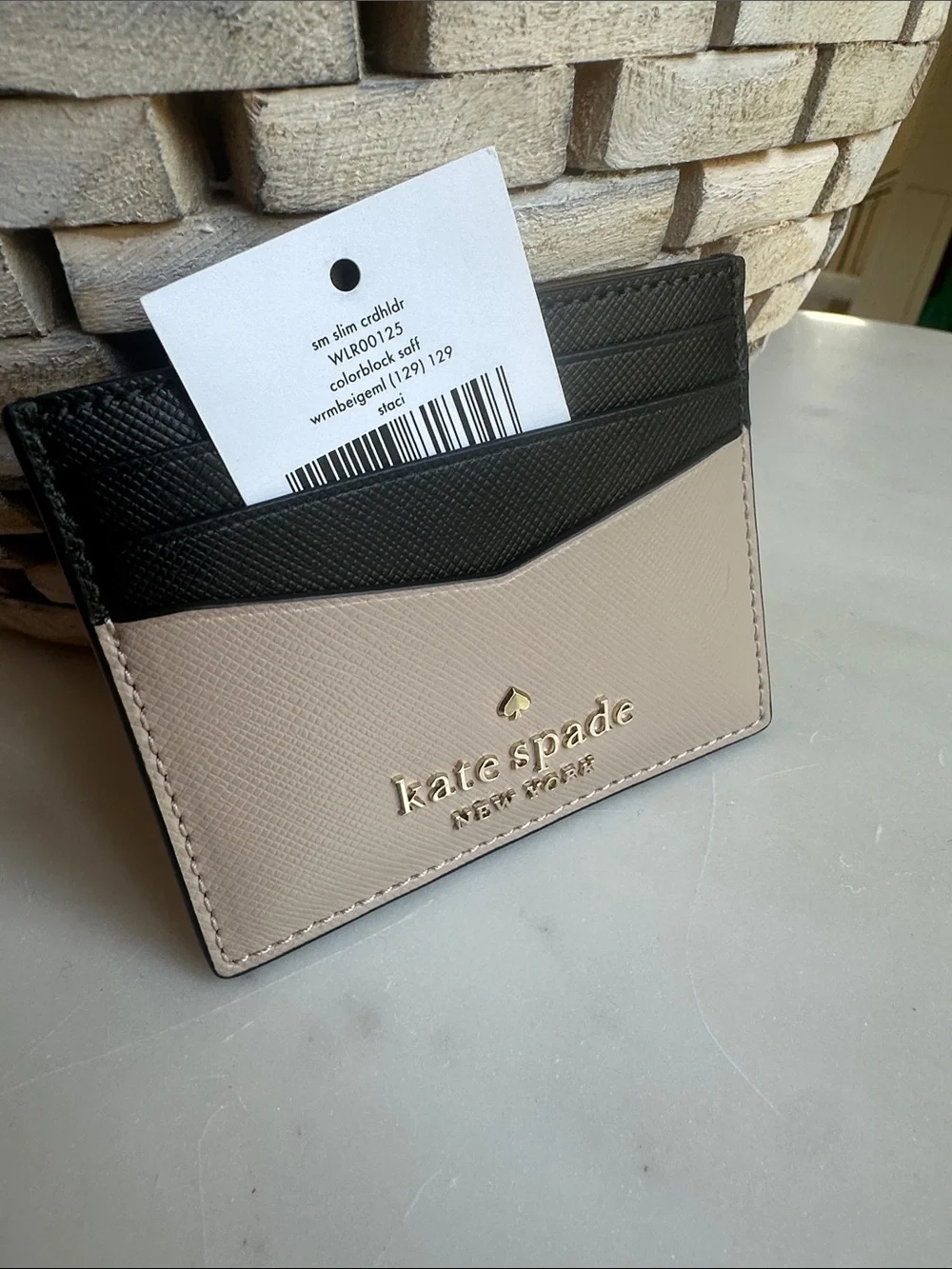 kate spade two-tone black and beige leather card holder